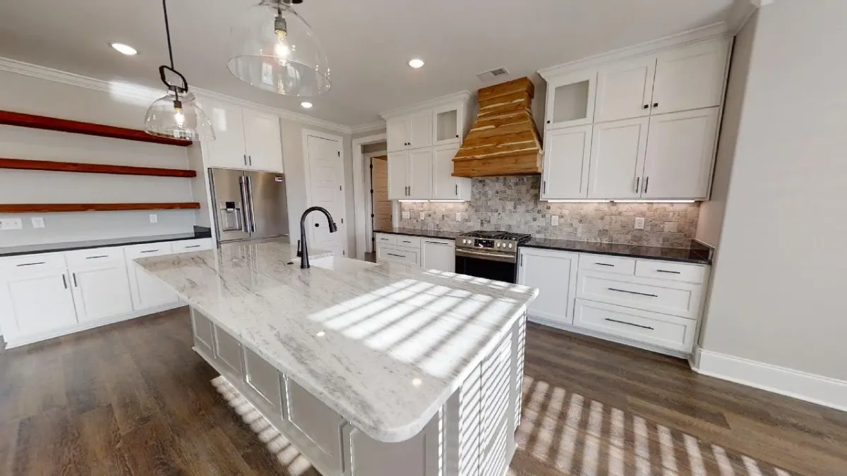 Amazing kitchen and quartz countertop style.