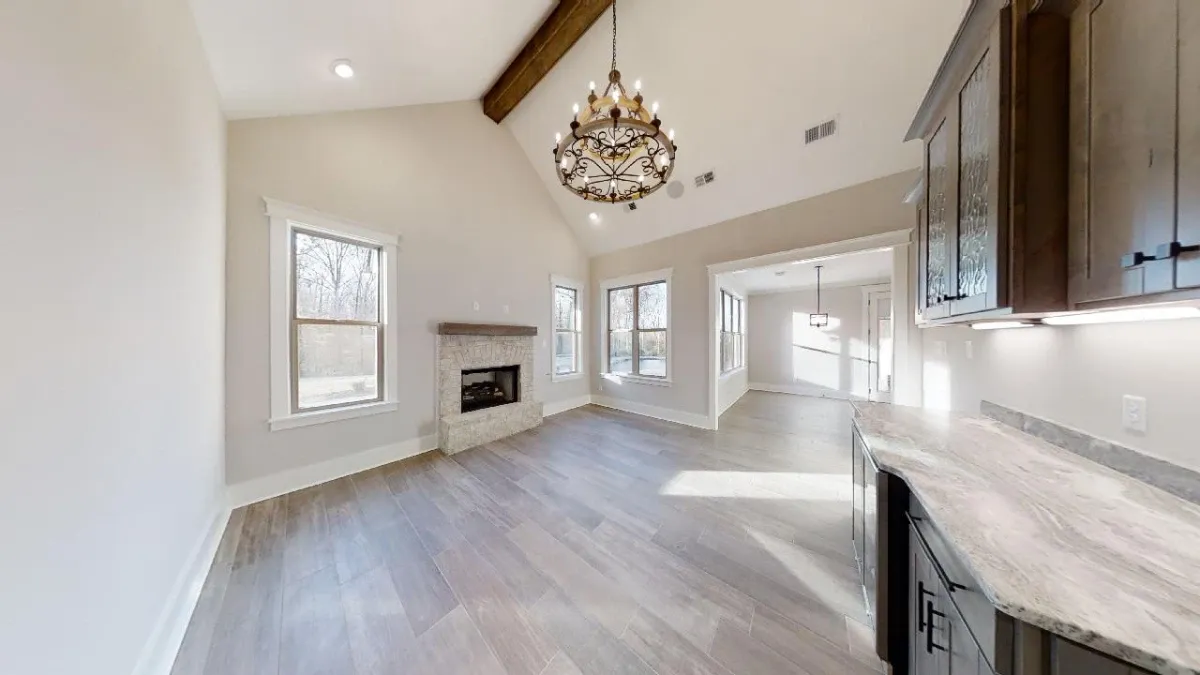 Custom home showing the open floor plan and family room.