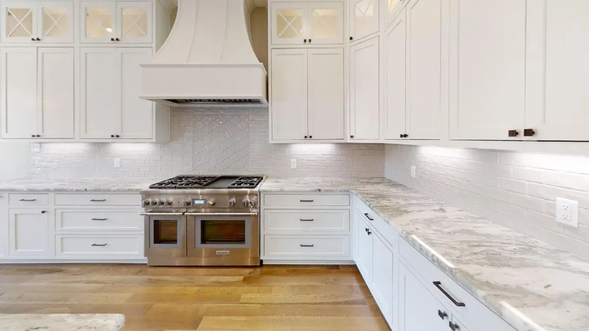 Large open kitchen with a wide counter.