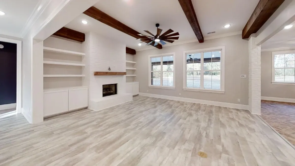 Beautiful family room with bookshelf and fireplace