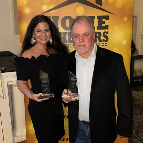 Monica and Sean Green recieve awards for custom home building.