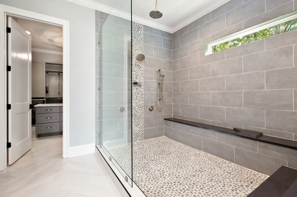 Large tiled walk-in shower.