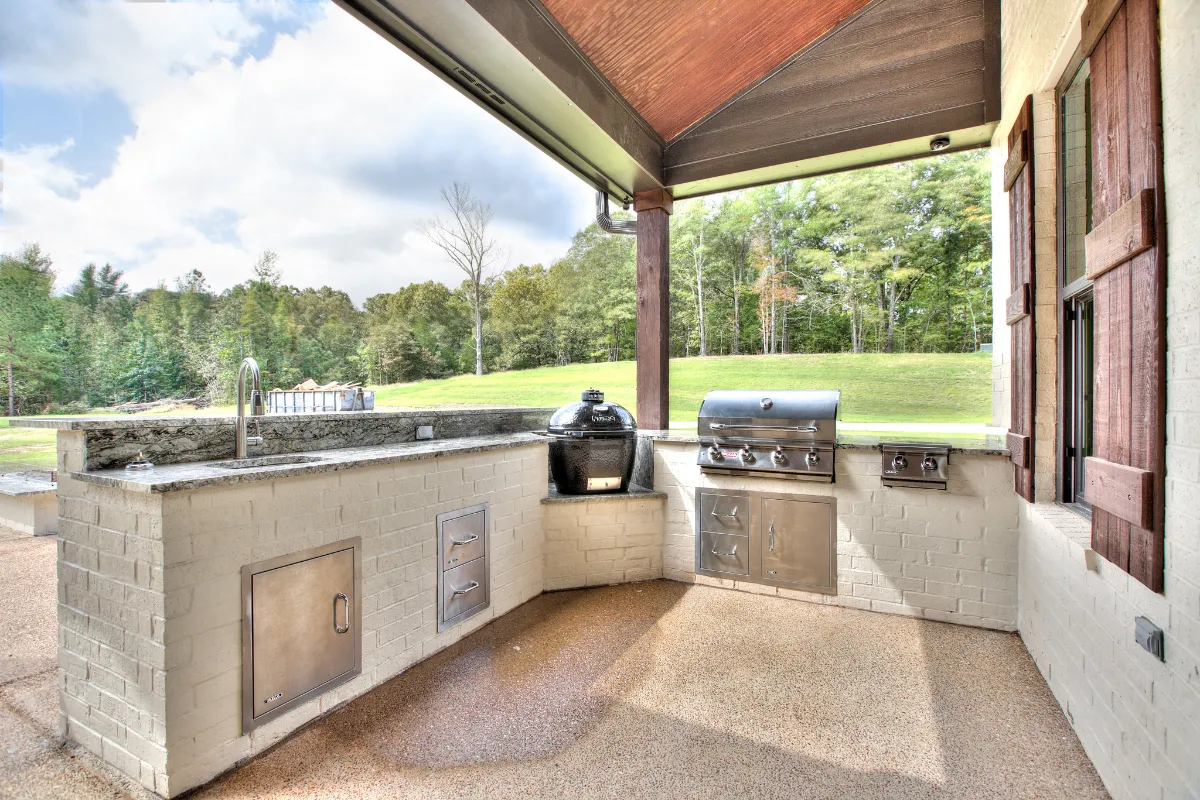 Outdoor kitchen and covered back porch.